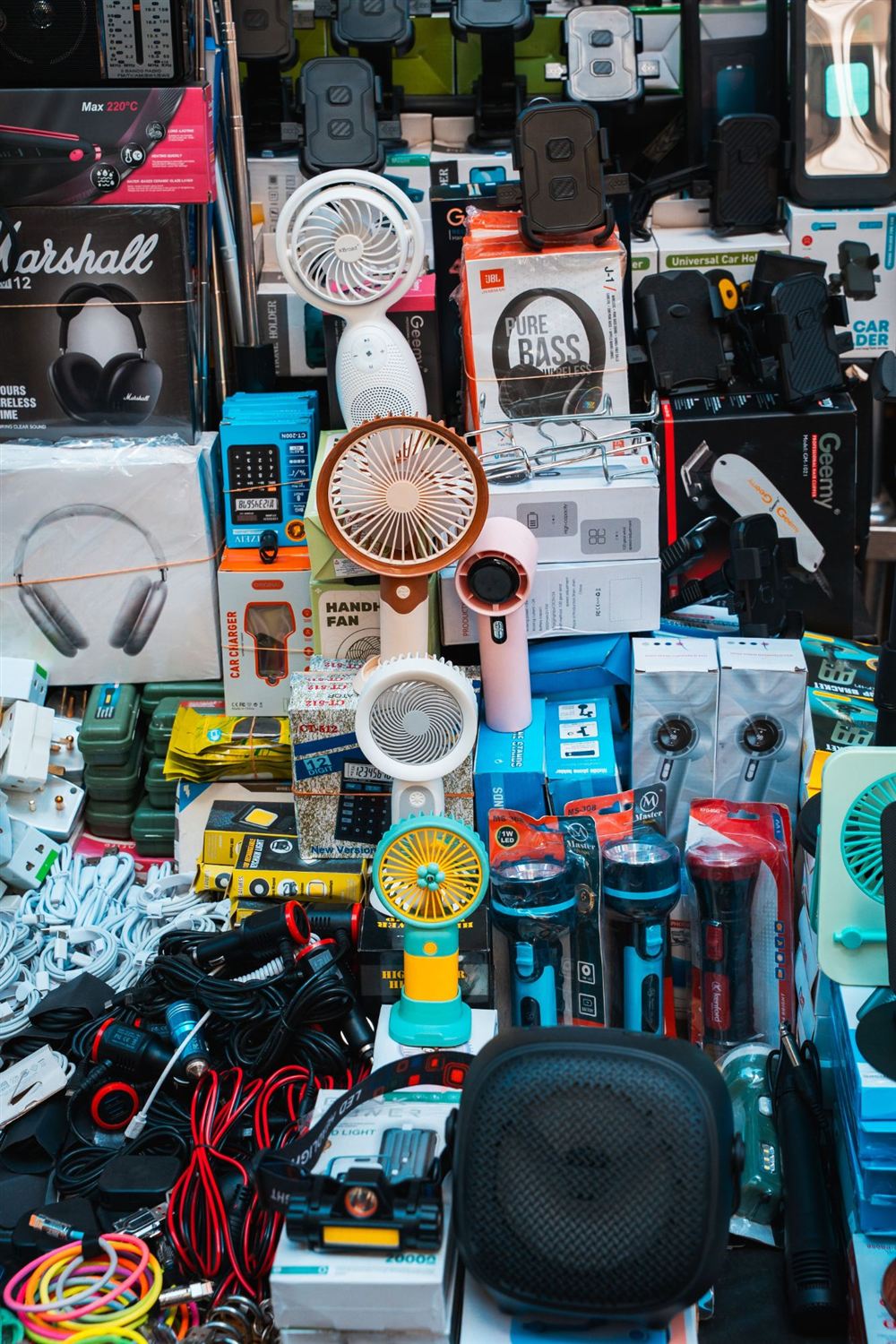 Consumer electronics and accessories: fans, headphones, chargers and torches